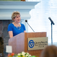Distinguished Alumni giving speech
